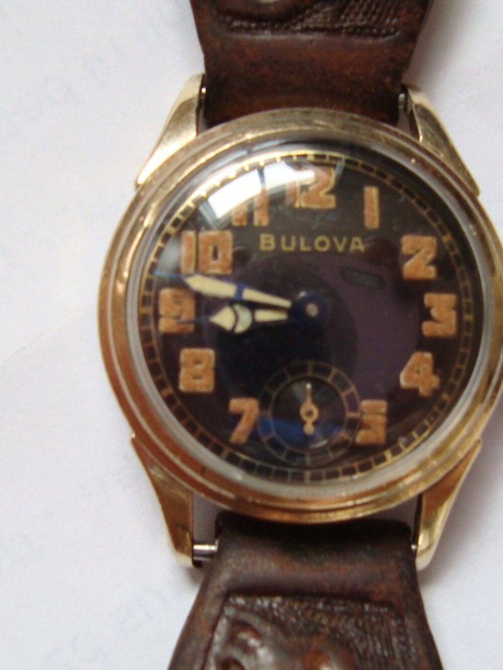 VINTAGE LADY WIND UP BULOVA WW2 MILITARY STYLE,10K GOLD CLAPS TOP, STERLING BACK